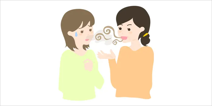 口臭に気付かず話している女性のイラスト