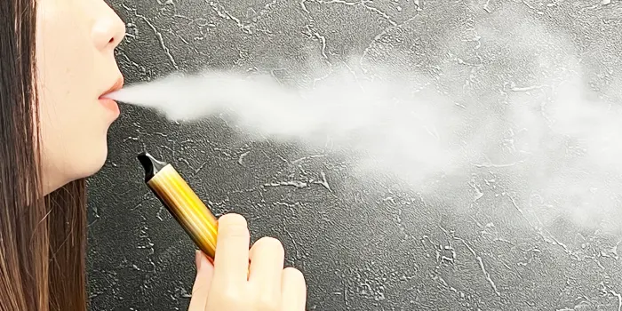 爆煙を吐き出す