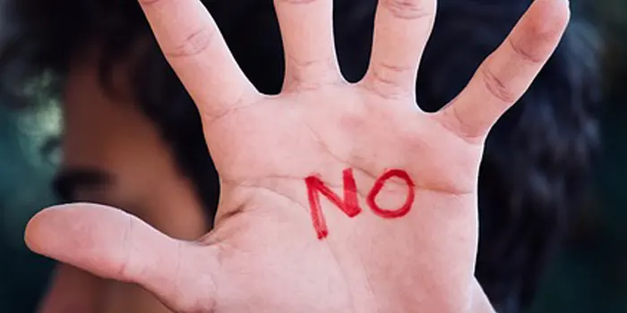NOと書かれた手