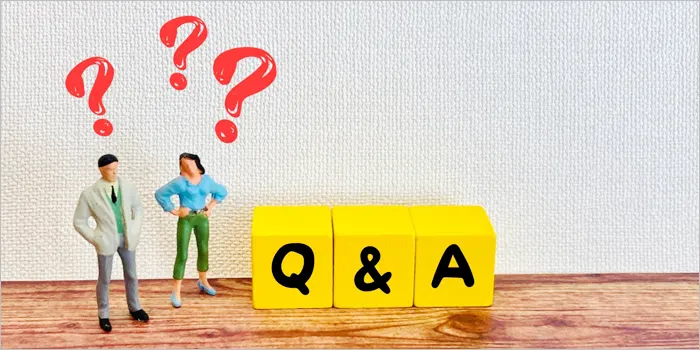 Q&Aの文字と？を浮かべる男女