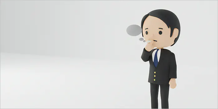 タバコを吸う男性の人形